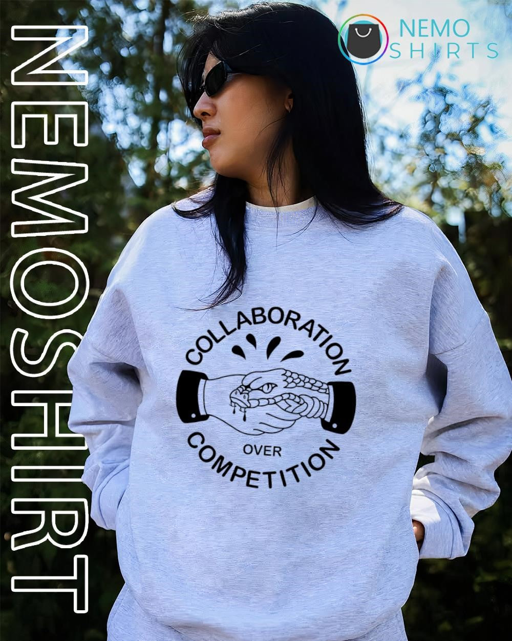 Collaboration Over Competition handshake with snake shirt