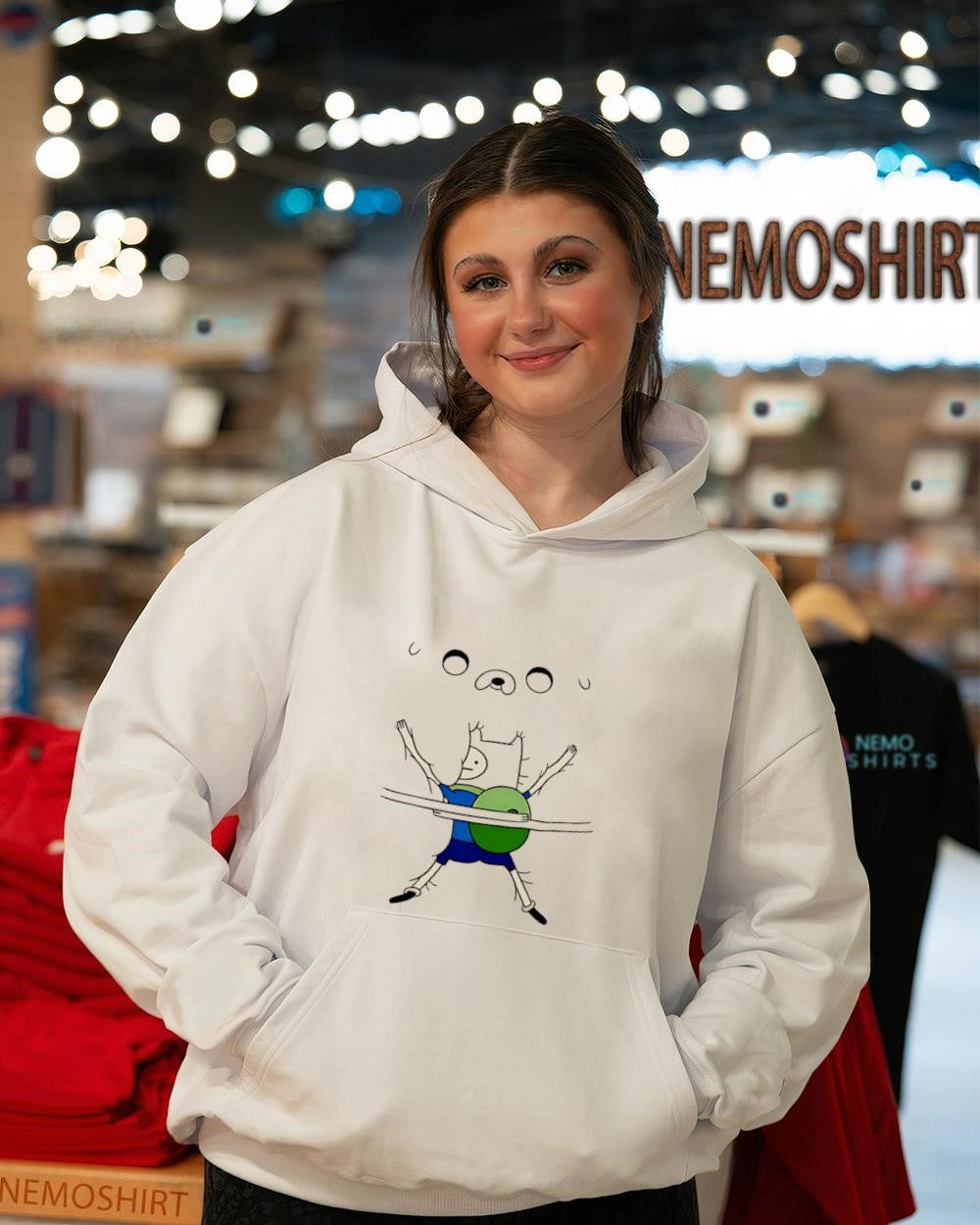 Finn holding Jake Adventure Time shirt