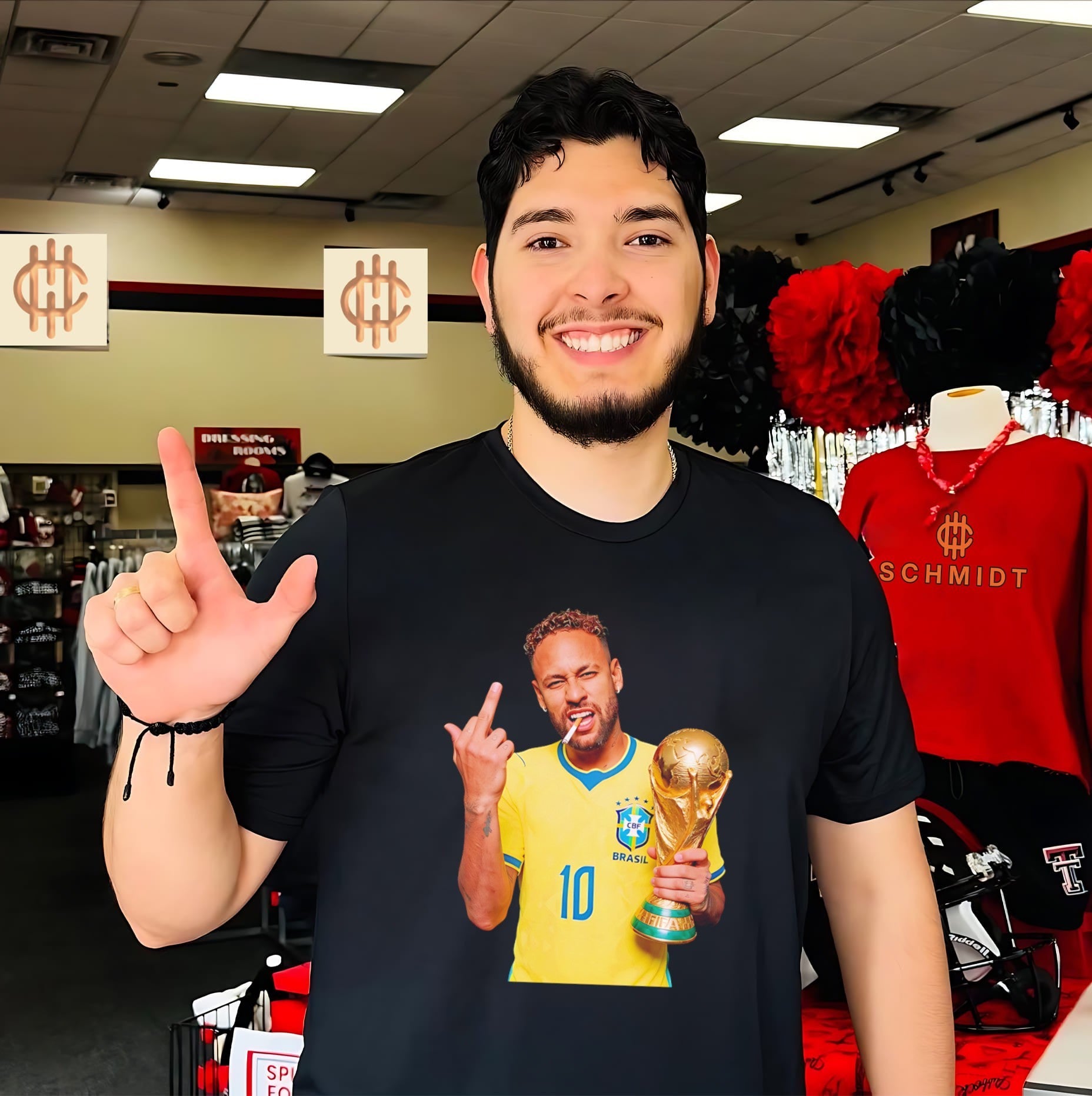 Neymar Jr holding trophy middle finger 2026 World Cup shirt