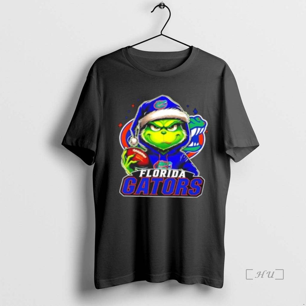 Officials Grinch Is Holding A Ball And Smiling At Florida Gators Fans Christmas Premium Shirt Hoodie Sweatshirt