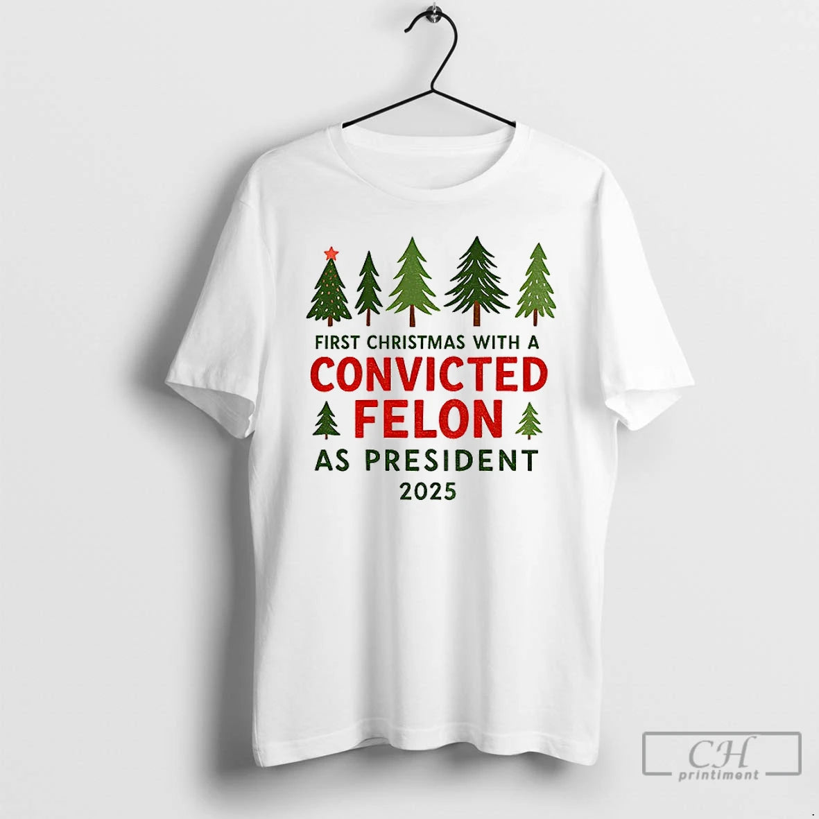 Premium Christmas Tree First Christmas With A Convicted Felon As President 2025 T Shirts Hoodie Sweatshirt | PurePodTees.com