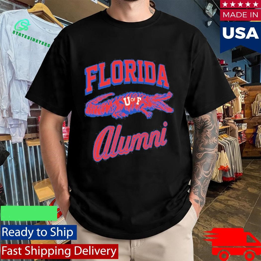 Tim Tebow Wearing University Of Florida Alumni Shirt