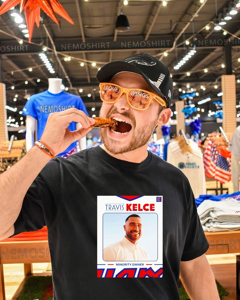 Travis Kelce minority owner shirt