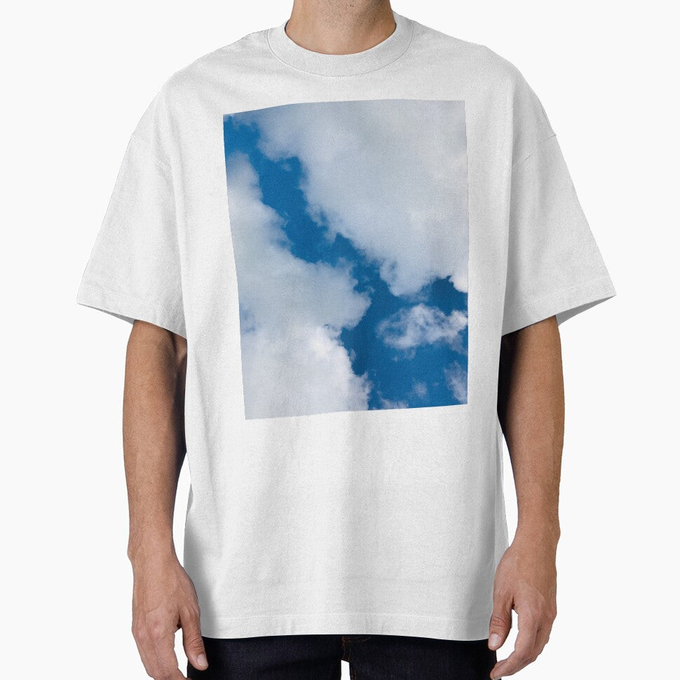 Blue sky with cotton like white clouds by NishanthiKG