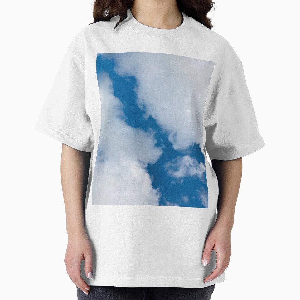 Blue sky with cotton like white clouds by NishanthiKG
