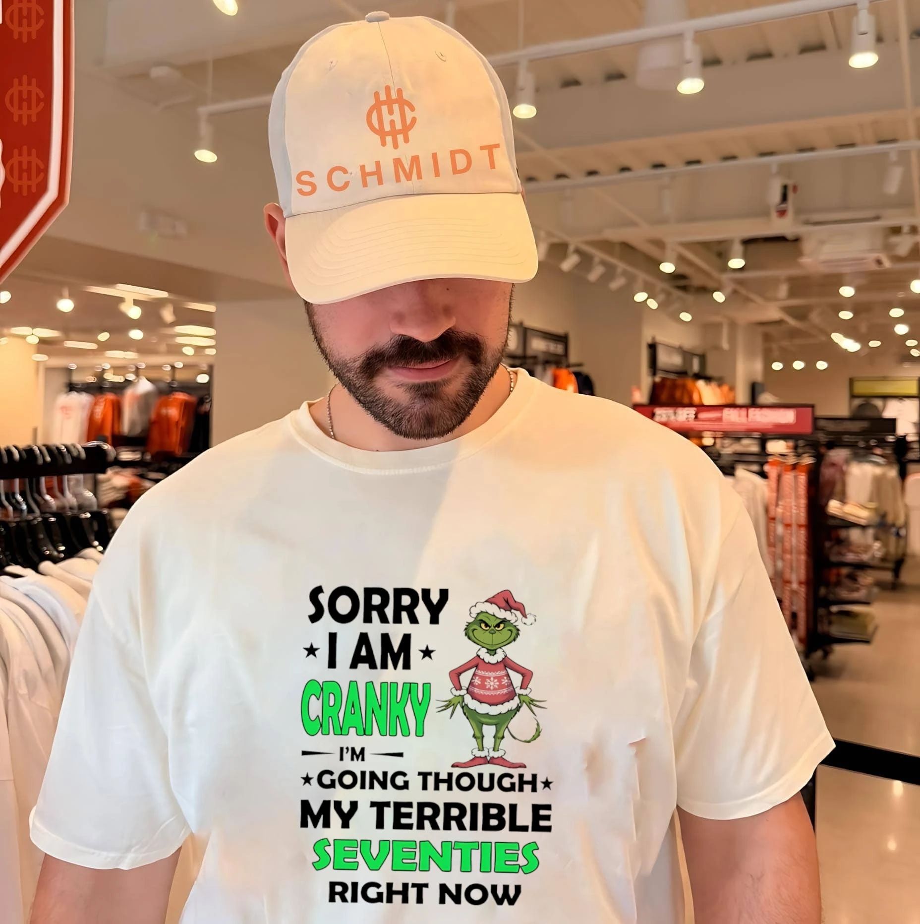 Sorry I am cranky I’m going through my terrible seventies right now Grinch shirt