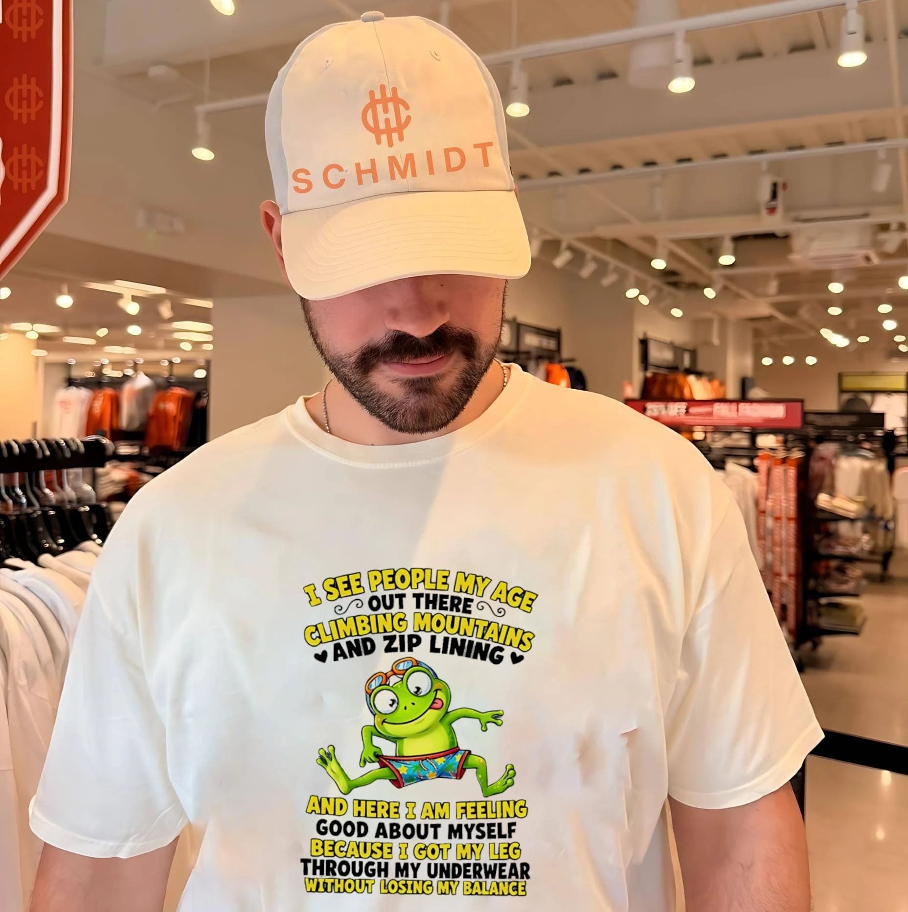 I see people my age out there climbing mountains an zip lining and here I am feeling cartoon frog shirt